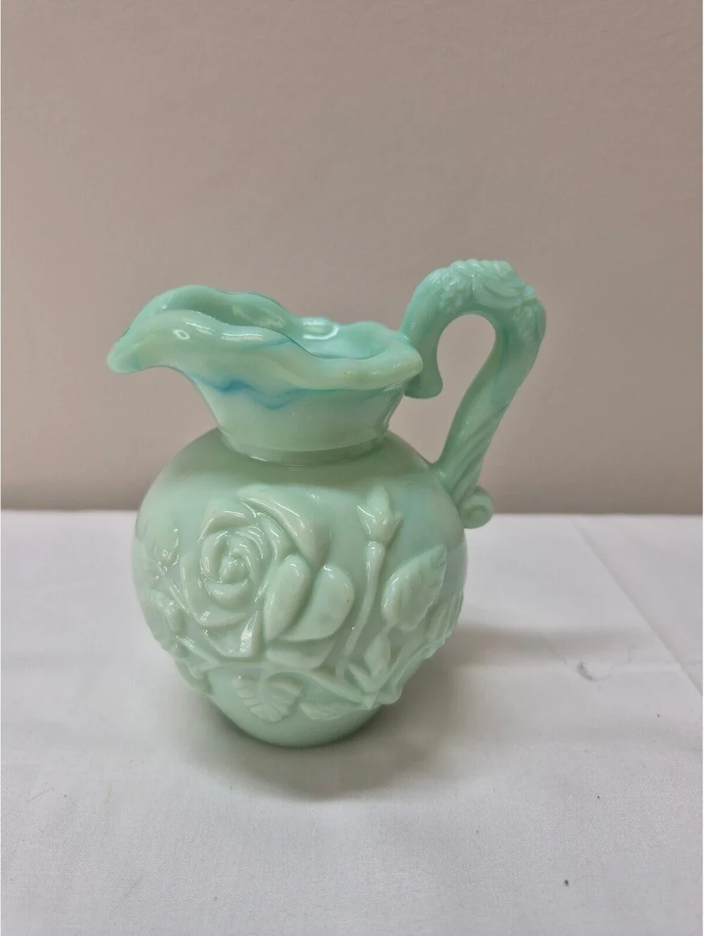 Vintage Avon Light Green Milk Glass Pitcher with Raised Floral Design J36